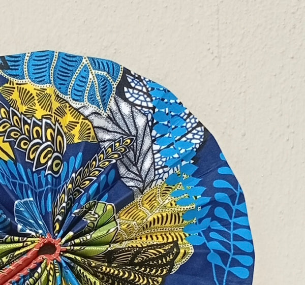Multicolor Floral Patchwork Fan - handmade multicolor floral patchwork cotton fan with leather handle by Yaw Broni