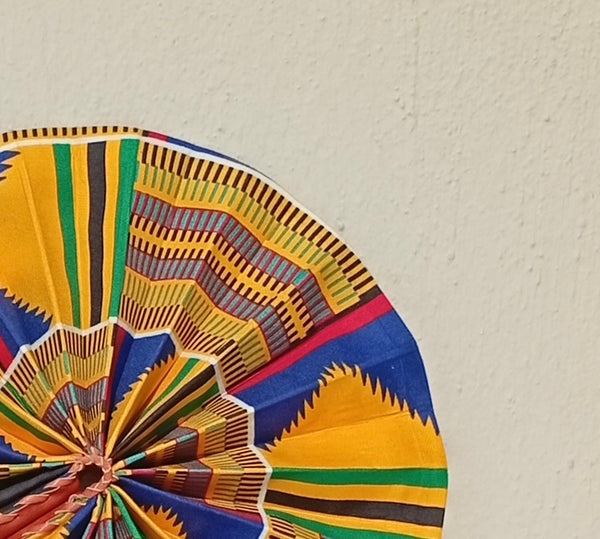 Multicolor Geometric Fan - handmade multicolor geometric cotton fan with leather handle by Yaw Broni