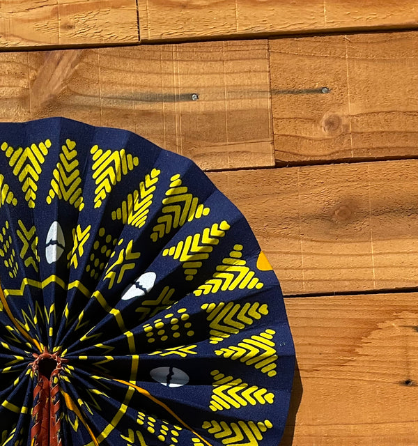 Navy & Yellow Pattern Fan - handmade navy and yellow bold cotton fan with leather handle by Yaw Broni