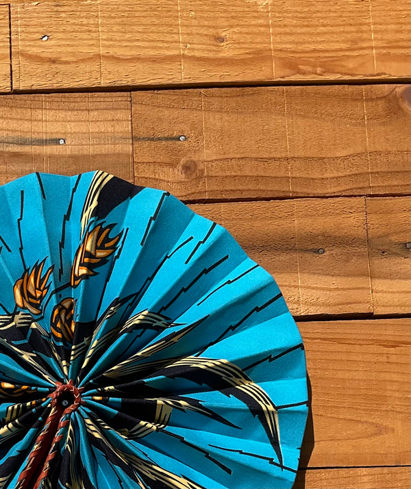Light Blue Floral Fan - handmade light blue floral cotton fan with leather handle by Yaw Broni