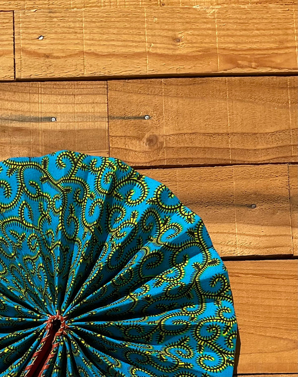Light Blue Pattern Fan - handmade light blue bold cotton fan with leather handle by Yaw Broni