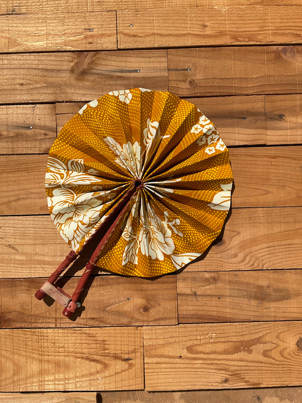 Cream & Orange Floral Fan - handmade cream and orange floral cotton fan with leather handle by Yaw Broni