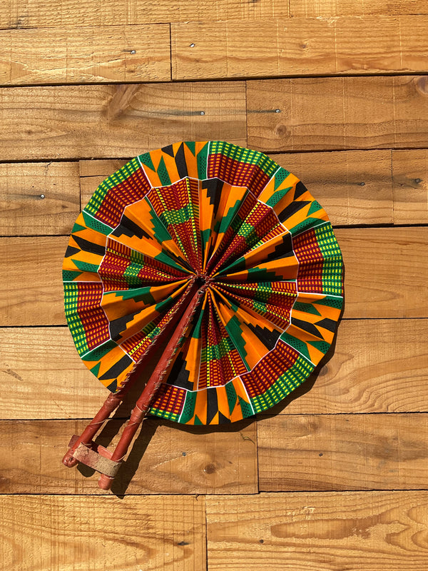 Green & Orange Geometric Fan - handmade green and orange geometric cotton fan with leather handle by Yaw Broni