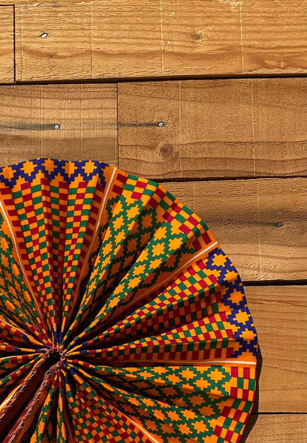 Rainbow Geometric Fan - handmade multicolor geometric cotton fan with leather handle by Yaw Broni