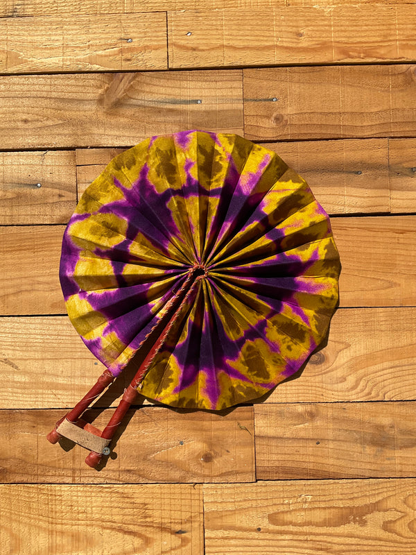 Tie-Dye Purple & Yellow Fan - handmade tie-dye purple and yellow cotton fan with leather handle by Yaw Broni