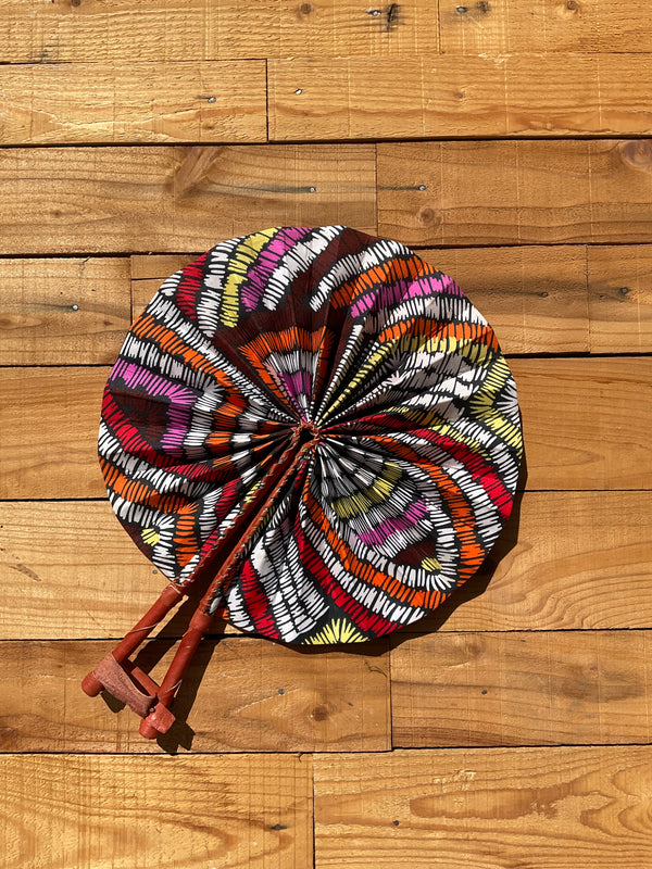 Multicolor Burst Fan - handmade vibrant multicolor cotton fan with leather handle by Yaw Broni