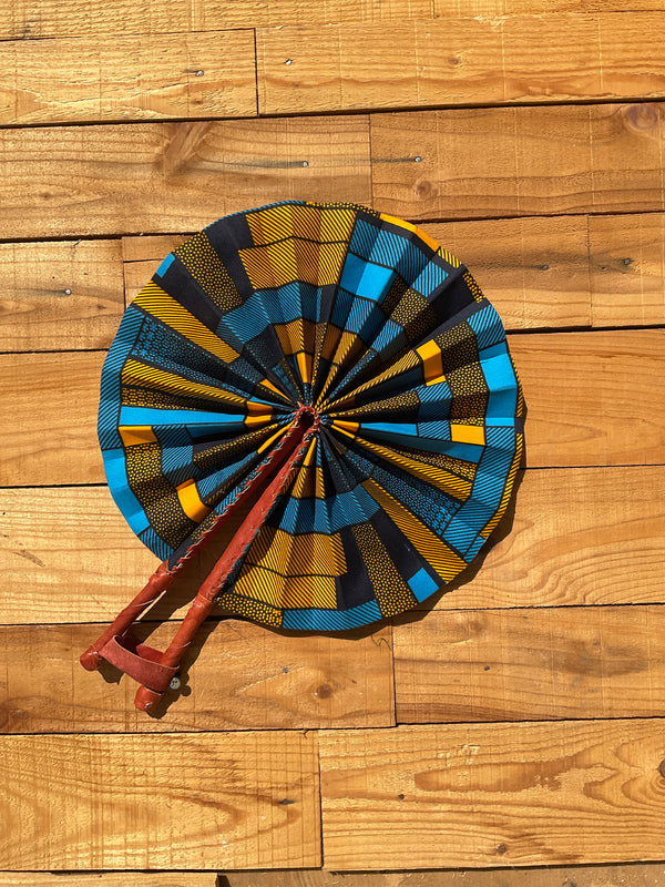 Blue Skies Geometric Fan - handmade blue and yellow geometric cotton fan with leather handle by Yaw Broni
